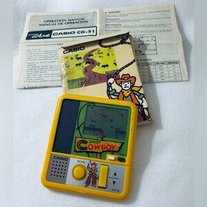 Casio Dandy Cowboy Handheld Console - Yellow and Black
